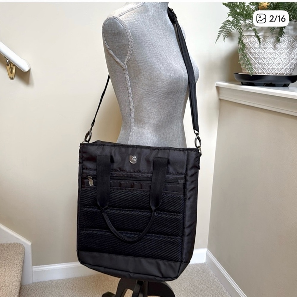 NWOT GAIAM black tote or crossbody yoga bag. Roomy with pockets and storage.